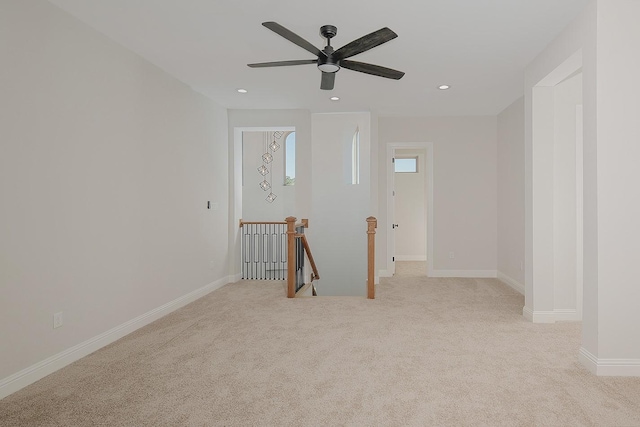 carpeted empty room featuring recessed lighting, baseboards, and ceiling fan