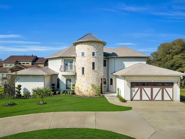 view of front of home with stucco siding, an attached garage, a front lawn, and a balcony