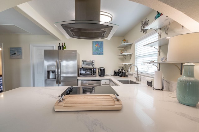 kitchen featuring a sink, a toaster, range hood, stainless steel appliances, and open shelves