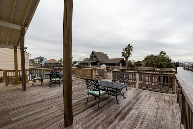 deck featuring a water view