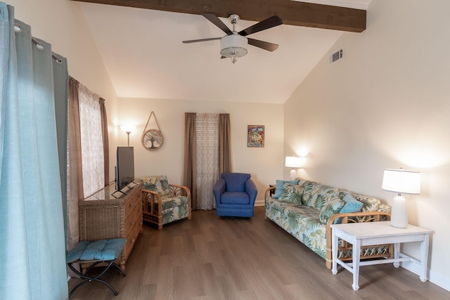 living room with visible vents, beamed ceiling, wood finished floors, and a ceiling fan