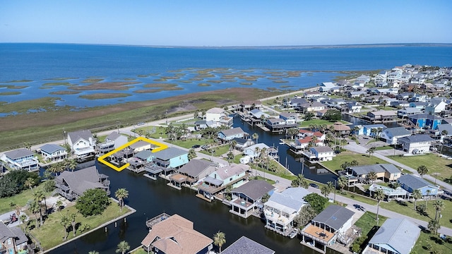 bird's eye view with a residential view and a water view