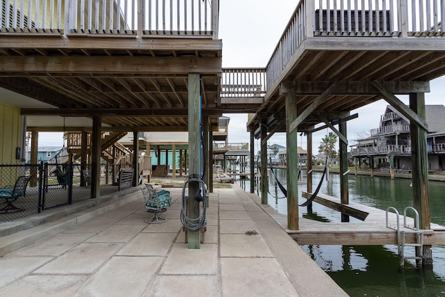 dock area with a water view