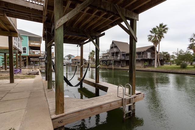 dock area with a water view