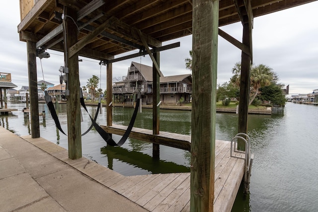 dock area featuring a water view