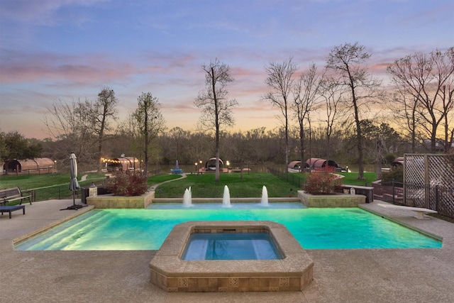 outdoor pool featuring a yard, a patio, and fence