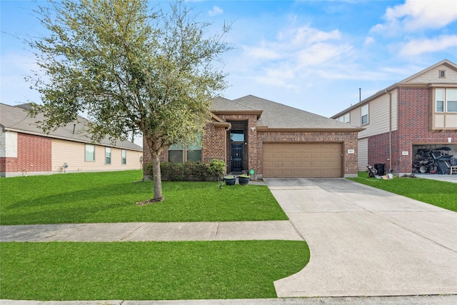 view of front facade featuring a front yard, driveway, roof with shingles, a garage, and brick siding