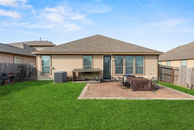 3615 Hawley Creek Dr, Spring, TX 77386 - rear view of property featuring central AC, a patio area, and roof with shingles