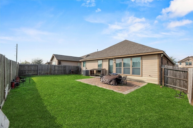3615 Hawley Creek Dr, Spring, TX 77386 - rear view of house featuring a patio, roof with shingles, and central air condition unit
