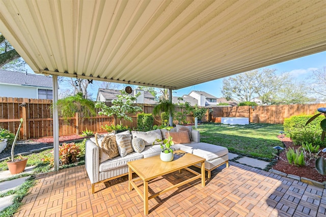 view of patio / terrace featuring an outdoor hangout area and a fenced backyard