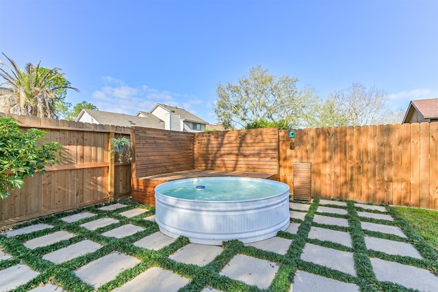 view of patio featuring a fenced backyard