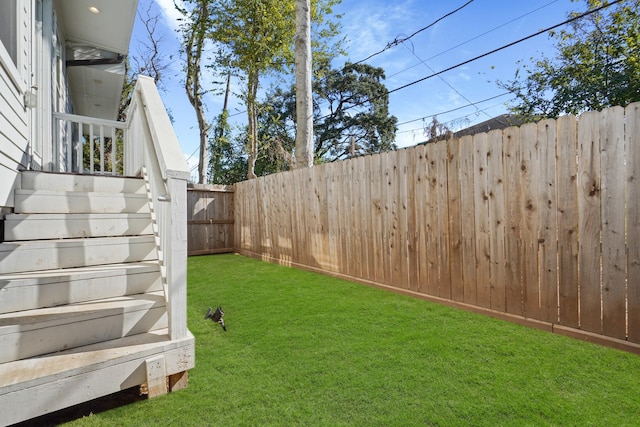 view of yard featuring a fenced backyard