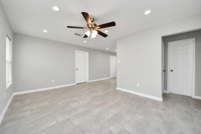 empty room featuring visible vents, recessed lighting, baseboards, and a ceiling fan