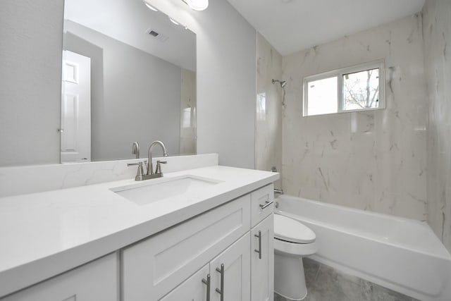 full bathroom featuring vanity, toilet, visible vents, and shower / bathtub combination