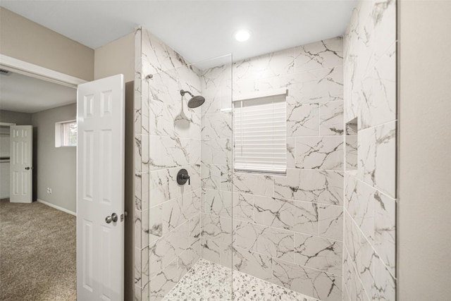 full bathroom featuring a tile shower