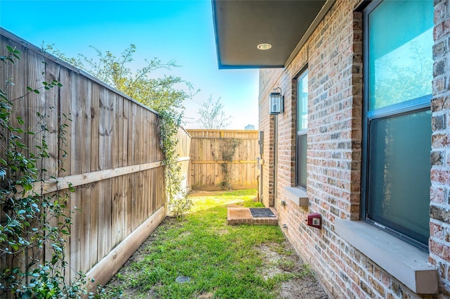 view of yard featuring a fenced backyard