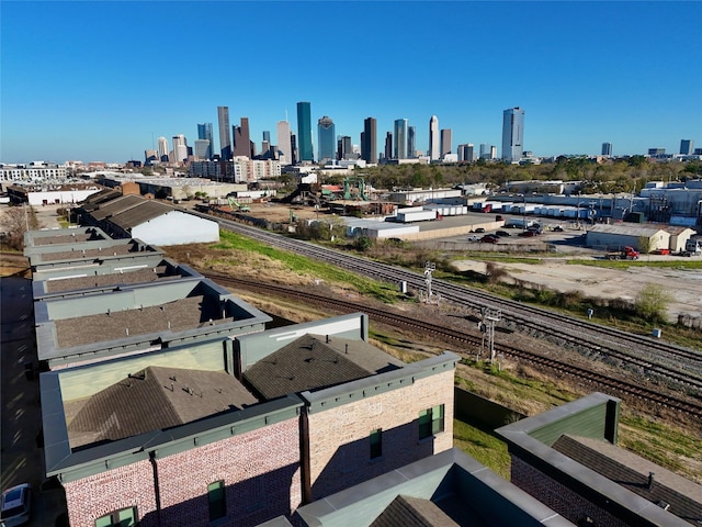 birds eye view of property featuring a city view