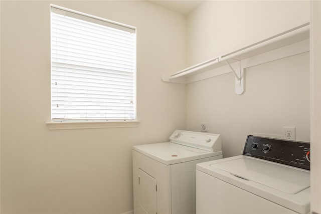 laundry area with washer and dryer and laundry area