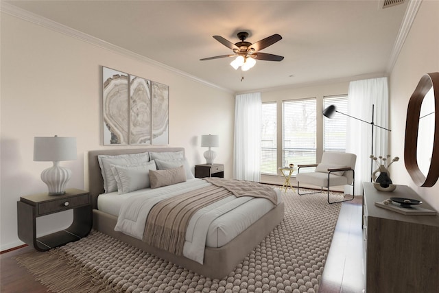 bedroom with a ceiling fan, wood finished floors, and crown molding