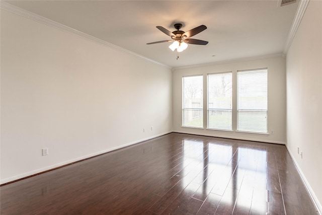 unfurnished room featuring dark wood-style floors, baseboards, ceiling fan, and ornamental molding