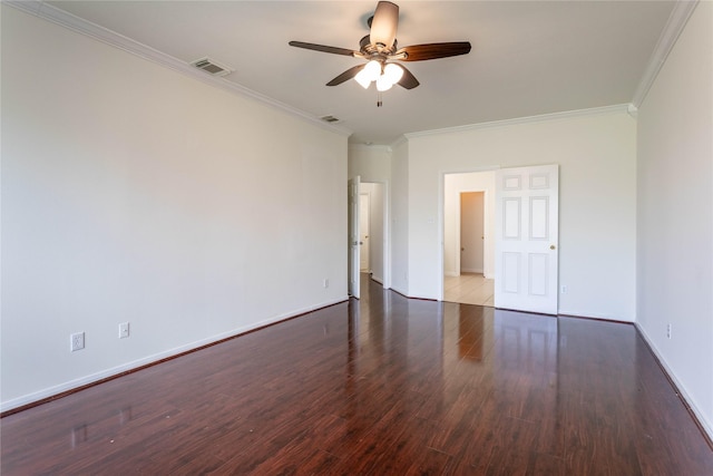 unfurnished room with wood finished floors, baseboards, visible vents, ornamental molding, and ceiling fan