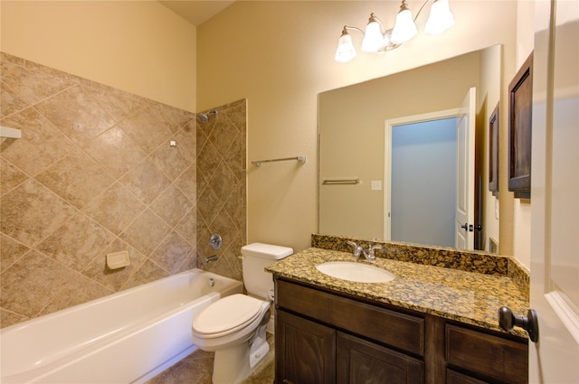 bathroom featuring vanity, toilet, and shower / tub combination