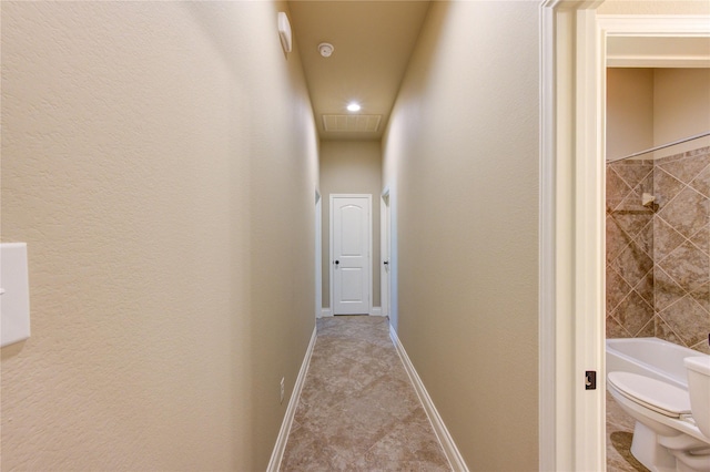 hallway with baseboards