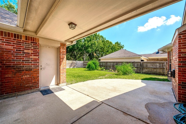 view of patio with a fenced backyard