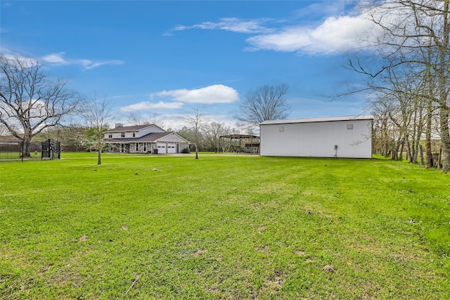 view of yard with an outbuilding and an outdoor structure