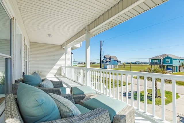 4010 Kiva Rd, Galveston, TX 77554 - balcony with a porch