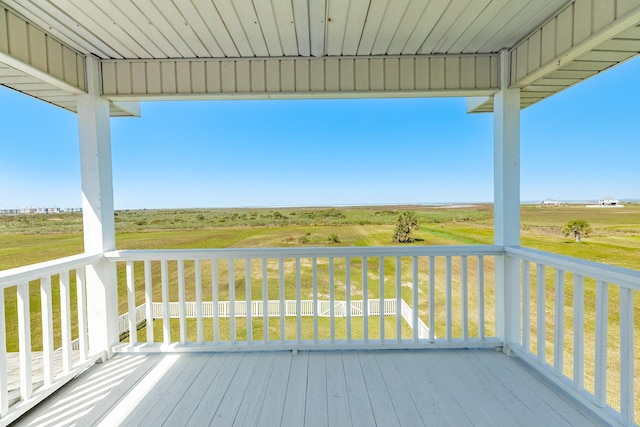 4010 Kiva Rd, Galveston, TX 77554 - wooden deck featuring a lawn