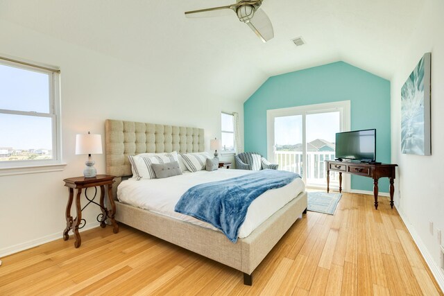 4010 Kiva Rd, Galveston, TX 77554 - bedroom featuring access to outside, light wood finished floors, ceiling fan, lofted ceiling, and baseboards