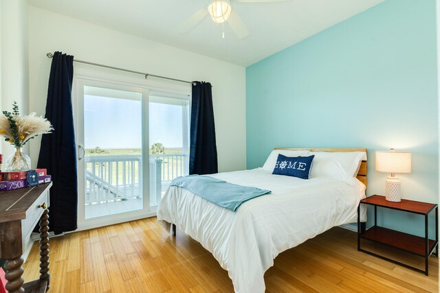 4010 Kiva Rd, Galveston, TX 77554 - bedroom featuring access to exterior, light wood-style floors, and a ceiling fan
