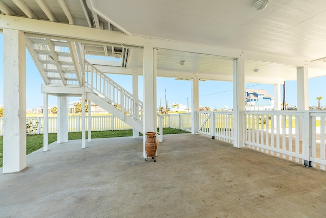 4010 Kiva Rd, Galveston, TX 77554 - view of patio / terrace featuring fence and stairway