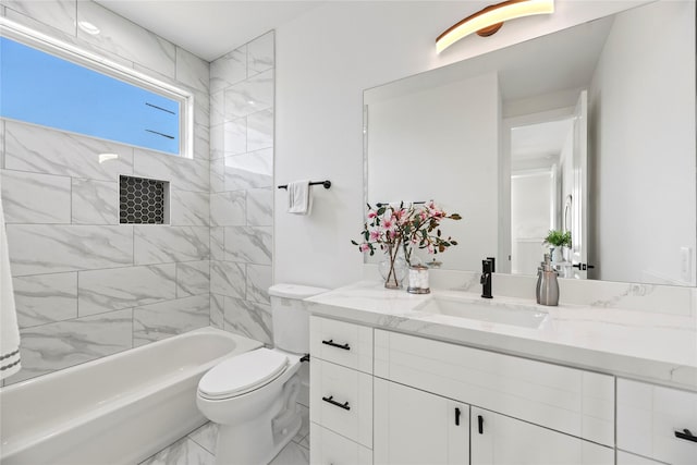 full bathroom with vanity, toilet, marble finish floor, and shower / bathtub combination