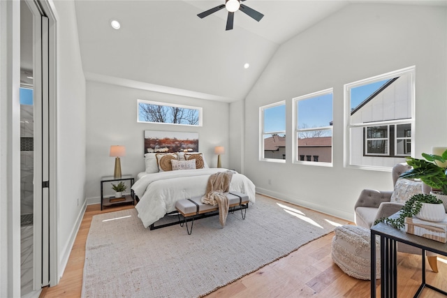 bedroom with baseboards, high vaulted ceiling, recessed lighting, ceiling fan, and light wood-type flooring