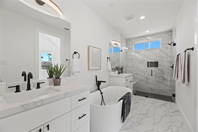 full bathroom with a sink, a marble finish shower, marble finish floor, and a healthy amount of sunlight