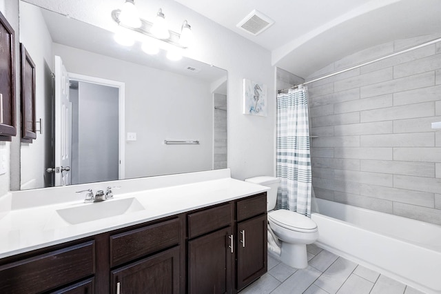 bathroom with visible vents, shower / tub combo, toilet, and vanity