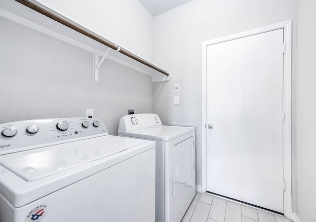 laundry area featuring laundry area and washing machine and clothes dryer