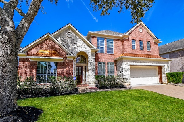 traditional-style home with a front yard, driveway, a standing seam roof, a garage, and brick siding