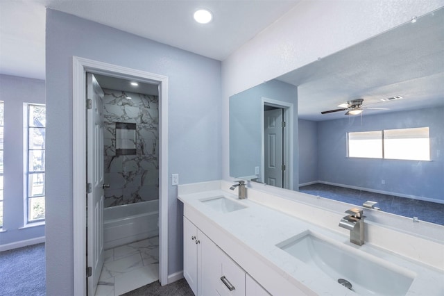 full bath with a sink, visible vents, marble finish floor, and double vanity