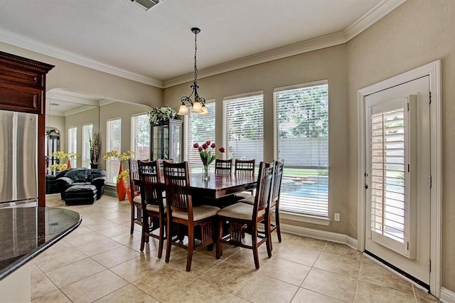 12610 Blanco Terrace Ln, Houston, TX 77041 - dining room featuring light tile patterned floors, a chandelier, ornamental molding, and baseboards