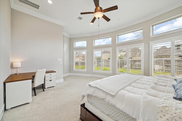 bedroom with visible vents, baseboards, carpet flooring, and crown molding