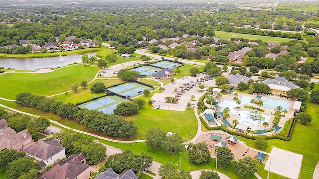 bird's eye view featuring a residential view and a water view