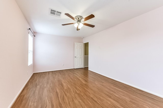3034 Thicket Path Way, Katy, TX 77493 - unfurnished room with light wood-style flooring, baseboards, visible vents, and ceiling fan