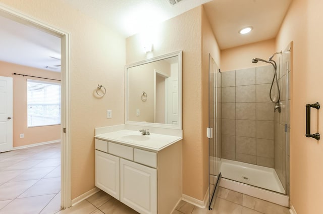 3034 Thicket Path Way, Katy, TX 77493 - bathroom with vanity, tile patterned flooring, and a tile shower