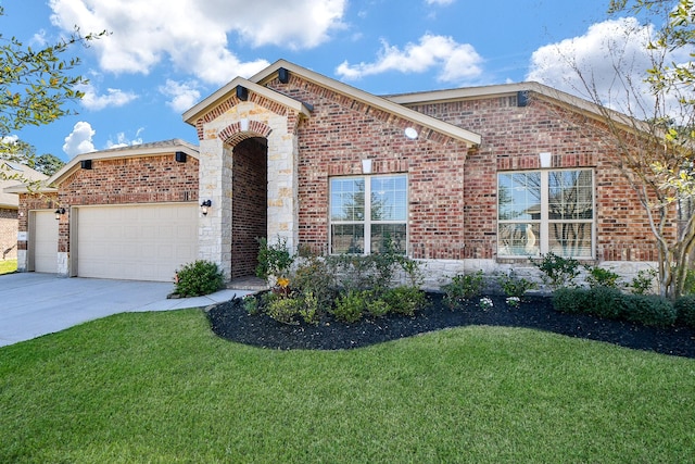 single story home featuring brick siding, an attached garage, concrete driveway, and a front lawn