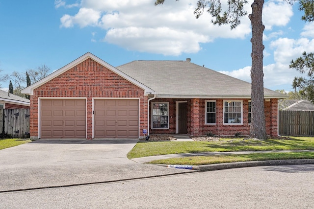 single story home featuring brick siding, a front lawn, fence, concrete driveway, and a garage