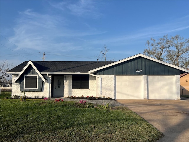 single story home with driveway, a front lawn, board and batten siding, roof with shingles, and an attached garage