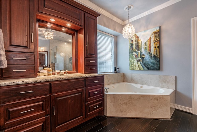 full bath with vanity, a garden tub, wood finished floors, a stall shower, and crown molding